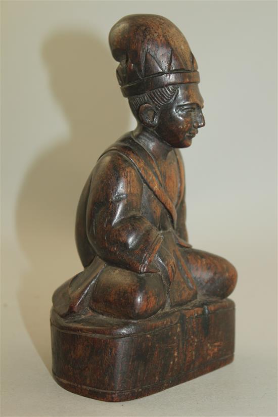 A Chinese Jichimu seated figure of a monk, 19th century, 8cm